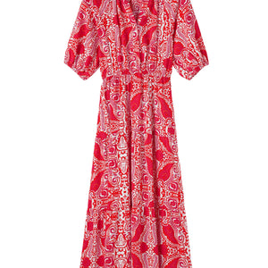 Red and white patterned dress on a white background